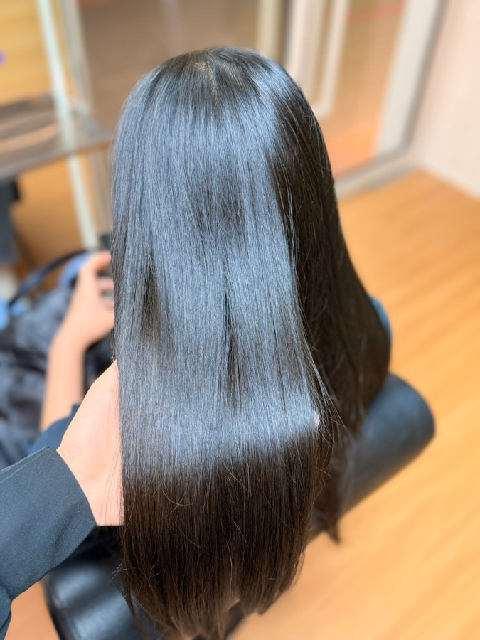 Sleek, healthy hair styled at Botani Beauty Story